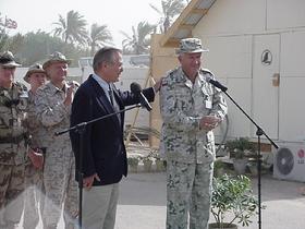 SECRETARY RUMSFELD AND POLISH ARMY GENERAL TYSZKIEWICZ at a ceremony at Camp Babylon, Iraq on September 6, 2003. 