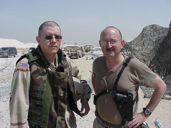 Colonel Larry West (R) and I at Camp Commando, Kuwait, April 2003.